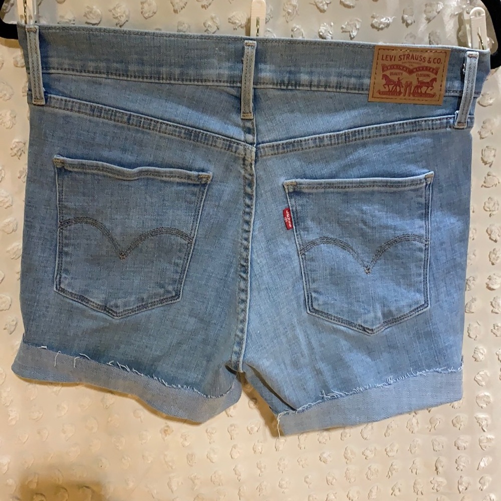 Levi’s size 27 cut off jean shorts 314 shaping straight stretchy high rise